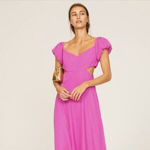 Turn heads in this stunning pink gown by Liv Foster